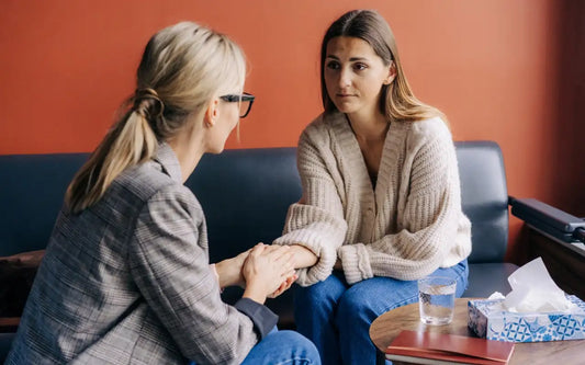 Supportive conversation between a caregiver and an autistic person, demonstrating effective communication strategies, active listening, and emotional support.