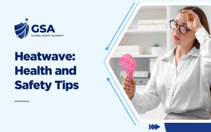 Course banner for Heatwave: Health and Safety Tips by Global Safety Academy, showing a woman in a white blouse wiping sweat from her forehead while holding a small pink portable fan in an office.