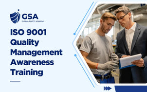 Global Safety Academy course banner for ISO 9001 Quality Management Awareness Training, depicting a corporate auditor checking production standards, quality control protocols, and compliance checklists with a technician.